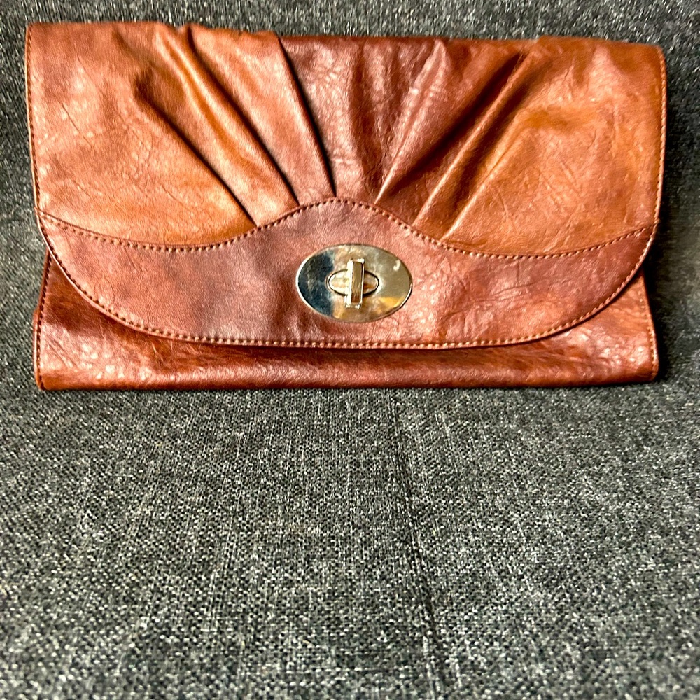 Bandolino brown leather clutch.